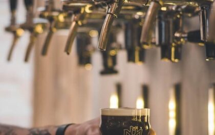 A beer tap filling a glass