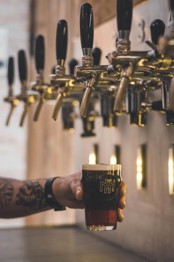 A beer tap filling a glass